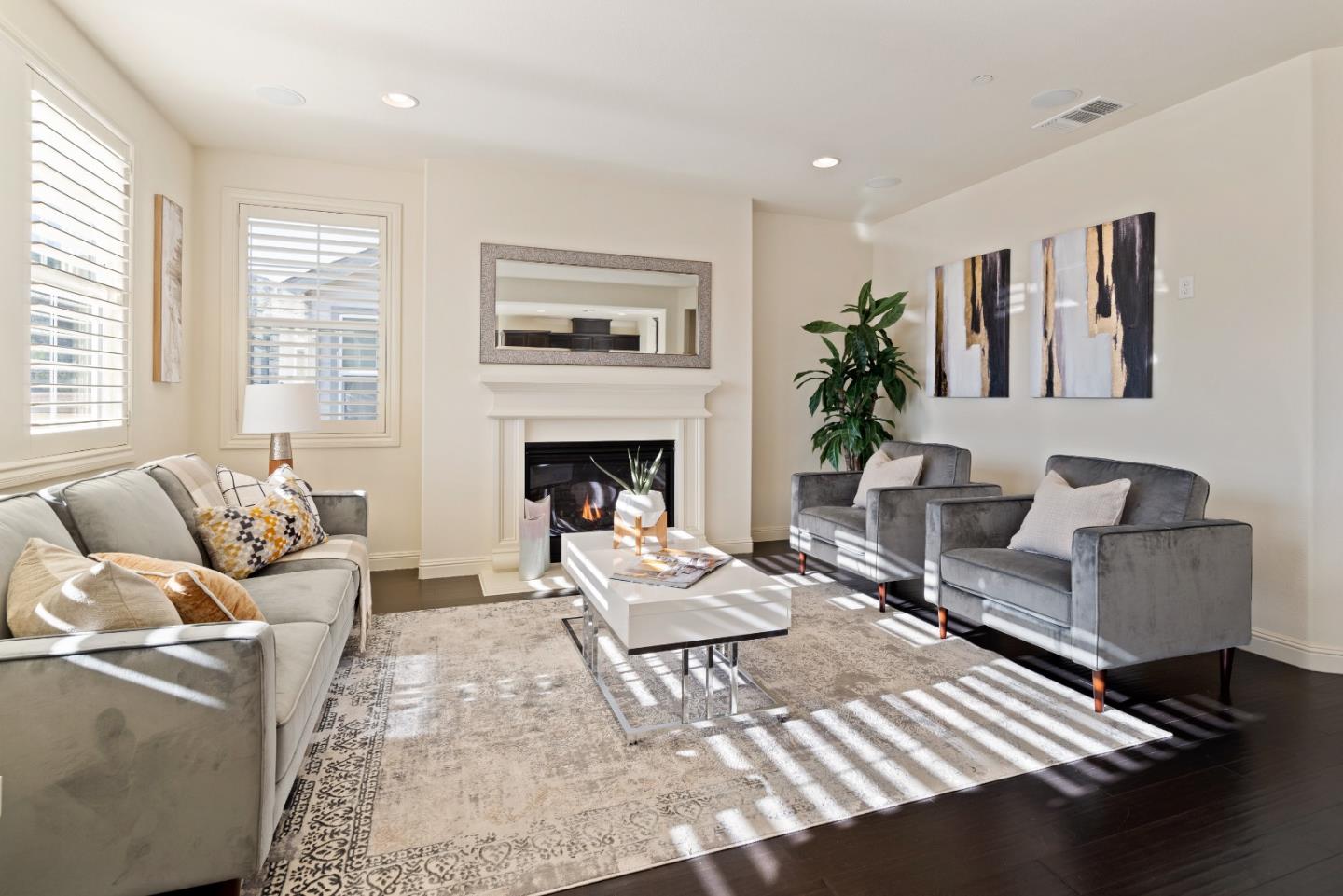147 Elderberry Lane Brisbane, CA 94005 - Photo 21 of 56 a living room with furniture and a fireplace