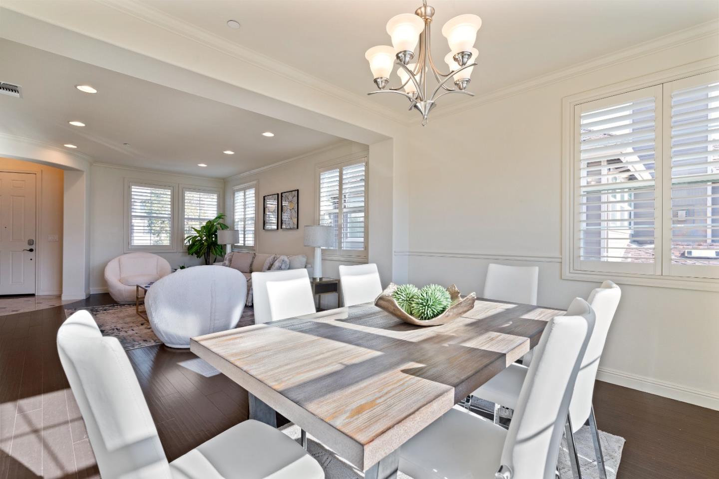 147 Elderberry Lane Brisbane, CA 94005 - Photo 22 of 56 a view of a dining room with furniture window and wooden floor