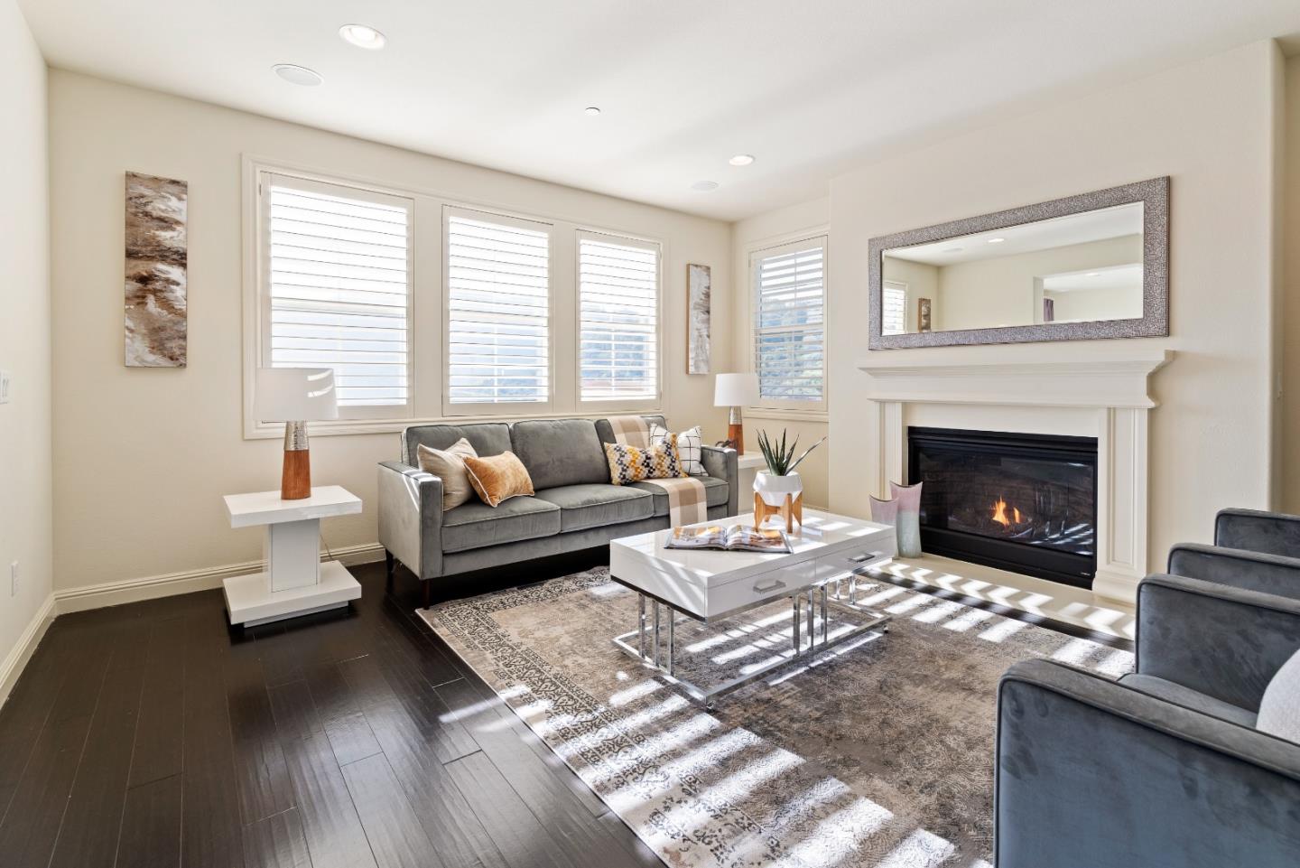 147 Elderberry Lane Brisbane, CA 94005 - Photo 24 of 56 a living room with furniture and a fireplace