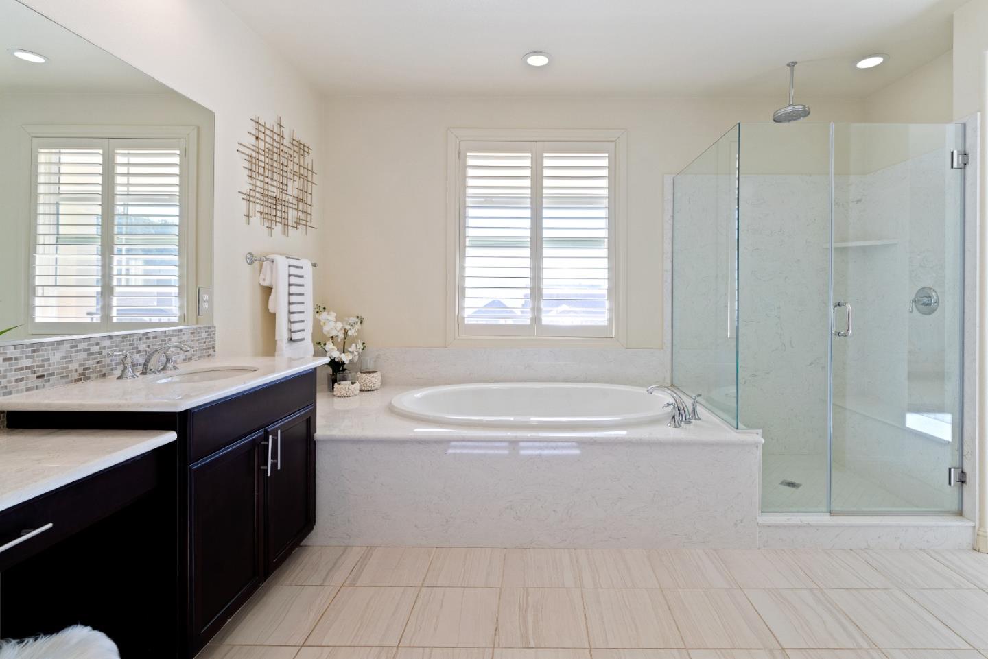 147 Elderberry Lane Brisbane, CA 94005 - Photo 30 of 56 a spacious bathroom with a tub sink shower and mirror