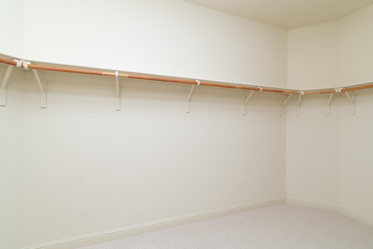 147 Elderberry Lane Brisbane, CA 94005 - Photo 32 of 56 a view of a room with racks on the wall