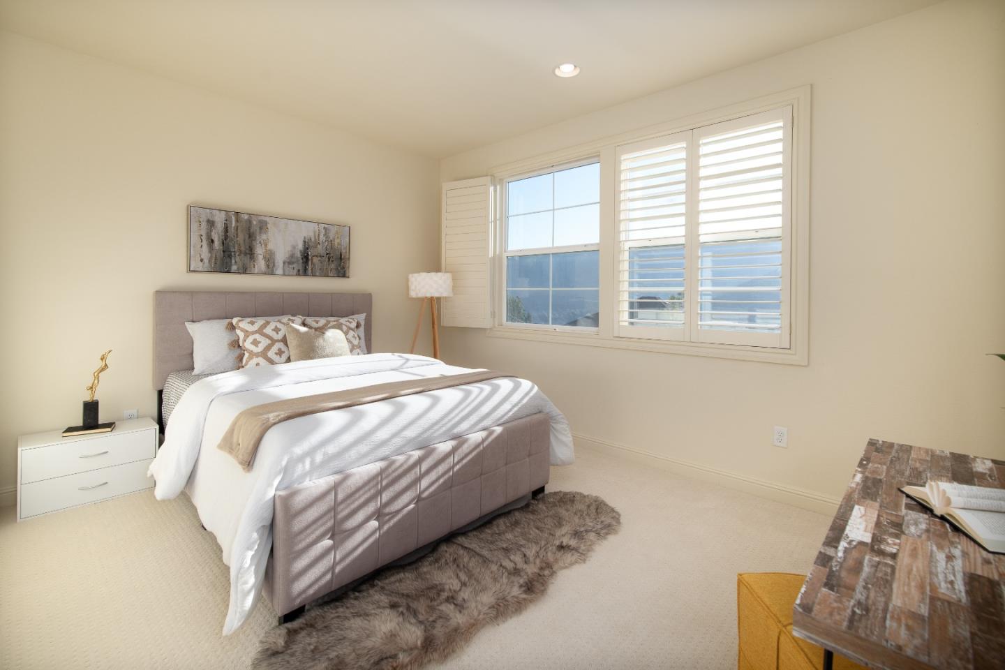 147 Elderberry Lane Brisbane, CA 94005 - Photo 34 of 56 a bedroom with a bed and wooden floor