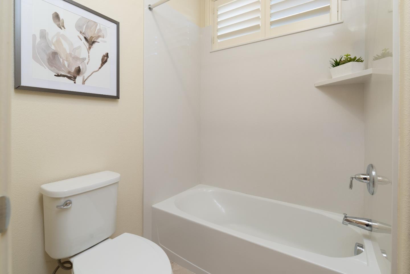 147 Elderberry Lane Brisbane, CA 94005 - Photo 37 of 56 a white toilet sitting next to a bath tub