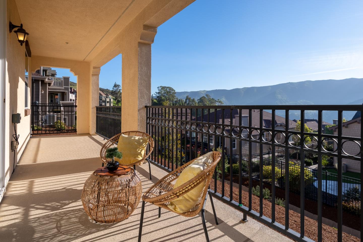 147 Elderberry Lane Brisbane, CA 94005 - Photo 46 of 56 a view of a balcony with chair and the floor to ceiling window