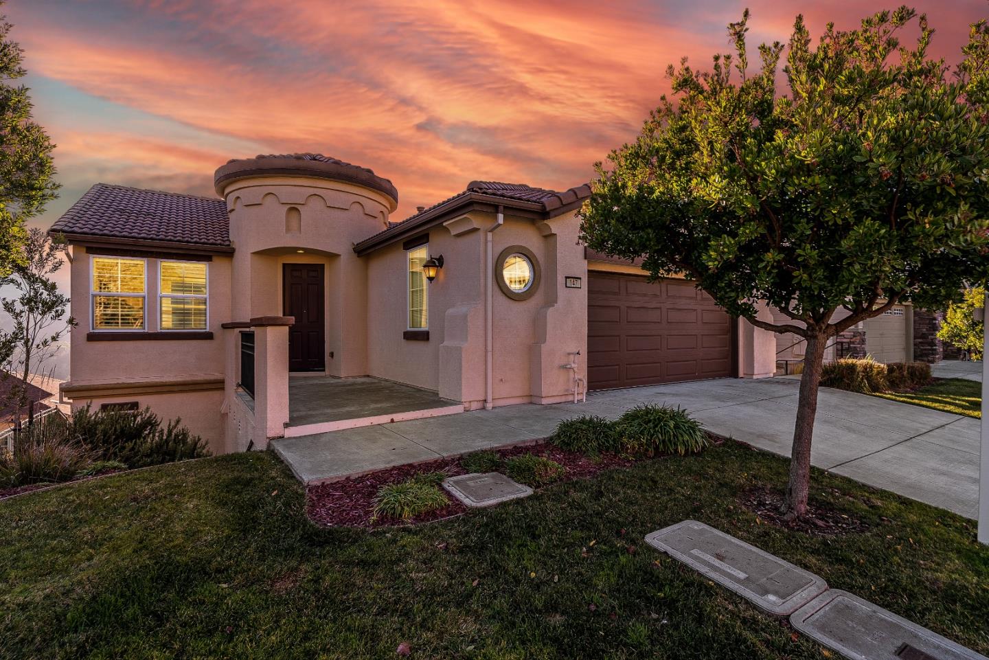 147 Elderberry Lane Brisbane, CA 94005 - Photo 55 of 56 a front view of a house with garden