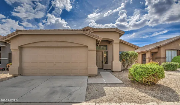 a view of a house with a garage