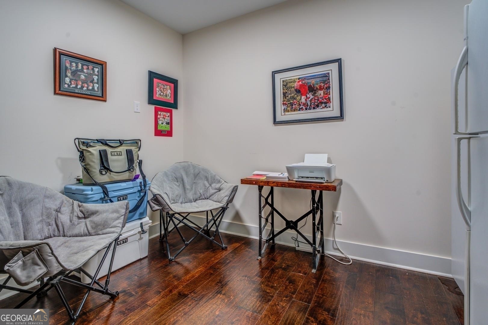 3060 Eatonton Road Madison, GA 30650 - Photo 44 of 65 a view of a workspace with furniture and wooden floor