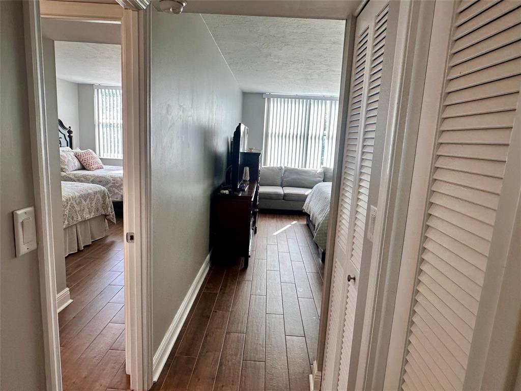 1147 Hillsboro Mile, Unit 214 Hillsboro Beach, FL 33062 - Photo 32 of 43 a en suite bathroom with a sink