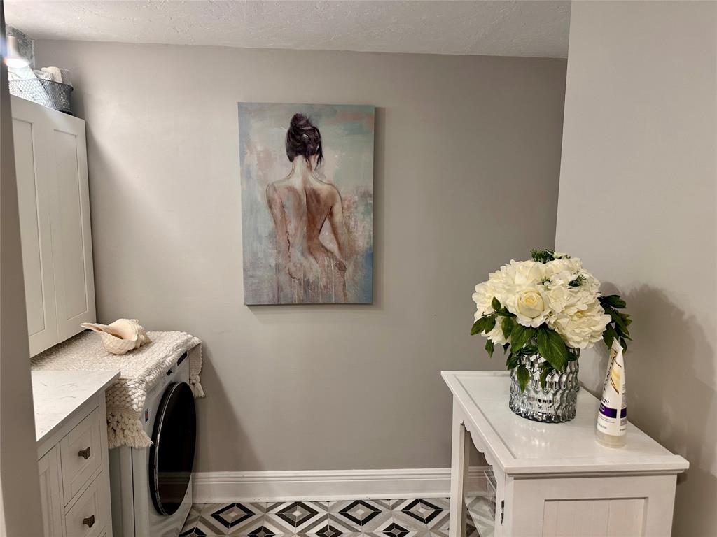 1147 Hillsboro Mile, Unit 214 Hillsboro Beach, FL 33062 - Photo 35 of 43 a bathroom with a sink mirror and vanity