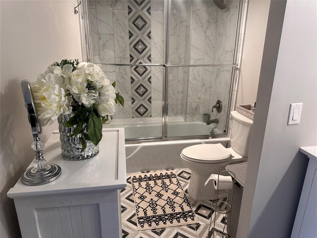 1147 Hillsboro Mile, Unit 214 Hillsboro Beach, FL 33062 - Photo 36 of 43 a bathroom with a sink toilet and shower