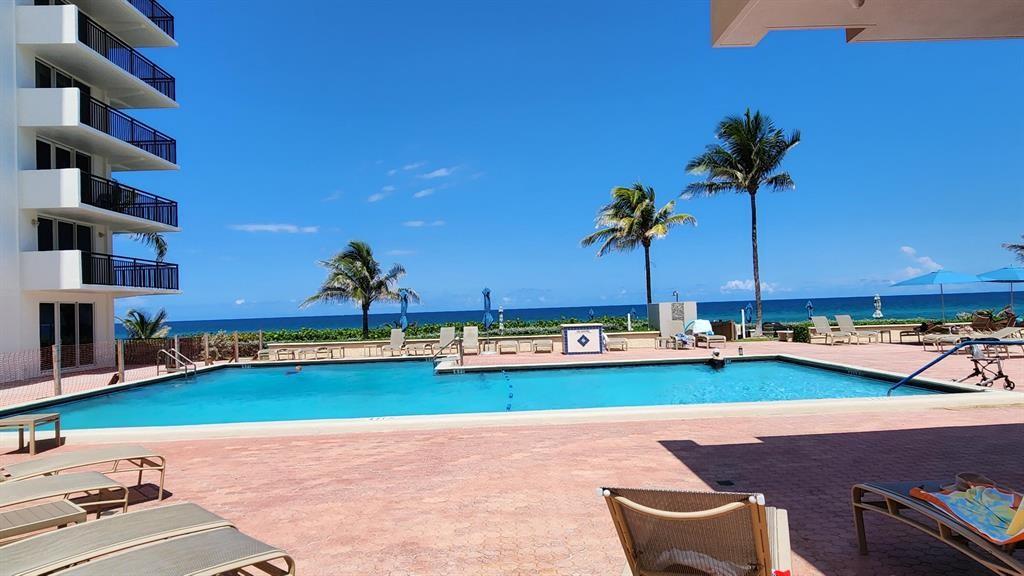 1147 Hillsboro Mile, Unit 214 Hillsboro Beach, FL 33062 - Photo 43 of 43 a view of a swimming pool and a couch