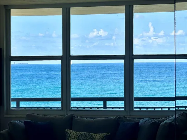 a view of a glass door with a view of the door