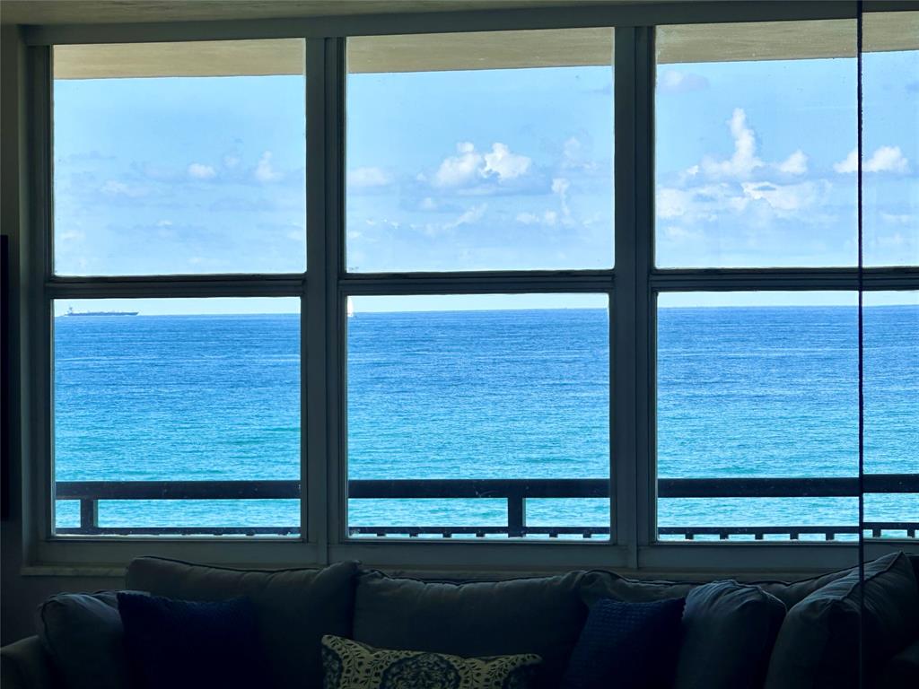 1147 Hillsboro Mile, Unit 214 Hillsboro Beach, FL 33062 - Photo 6 of 43 a view of a glass door with a view of the door