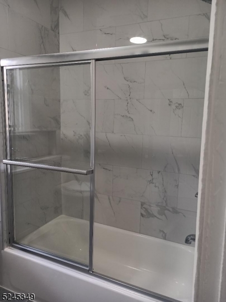 57 Maolis Avenue, Unit 2 Bloomfield, NJ 07003 - Photo 10 of 11 a bathroom with a shower