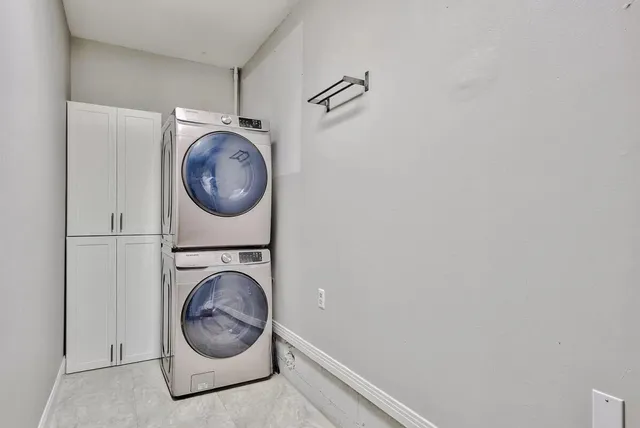 a view of washer and dryer in a utility room