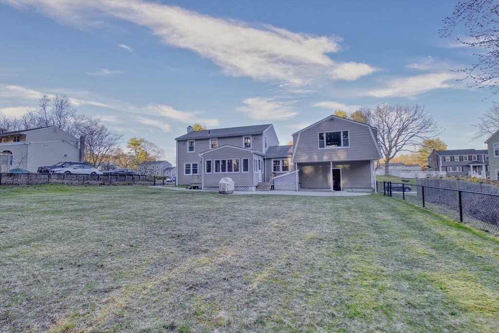17 Colt Road Franklin, MA 02038 - Photo 36 of 40 a view of a big house with a big yard and large trees