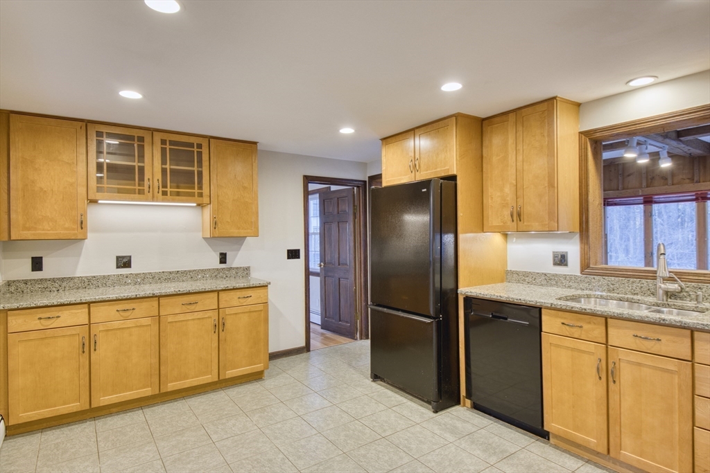17 Colt Road Franklin, MA 02038 - Photo 7 of 40 a kitchen with stainless steel appliances granite countertop a refrigerator a sink and dishwasher