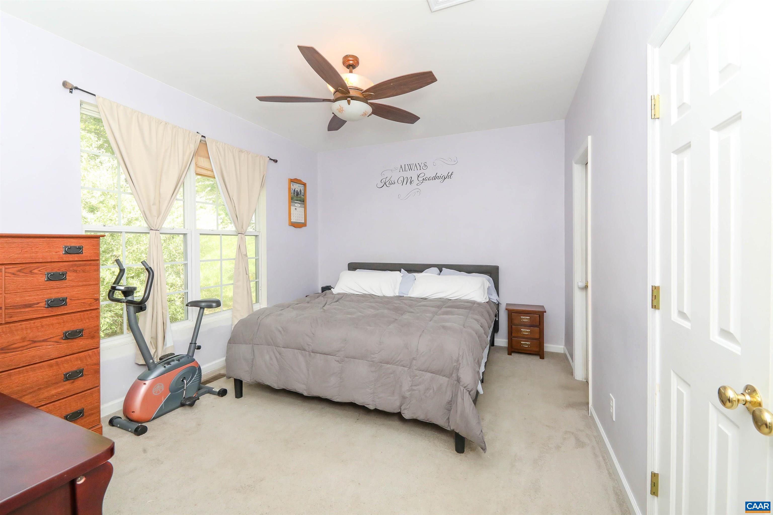 286 Snapdragon Road Ruckersville, VA 22968 - Photo 18 of 44 a bedroom with a bed and a window