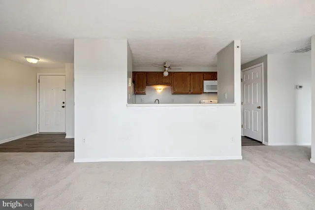 a view of a kitchen with a sink