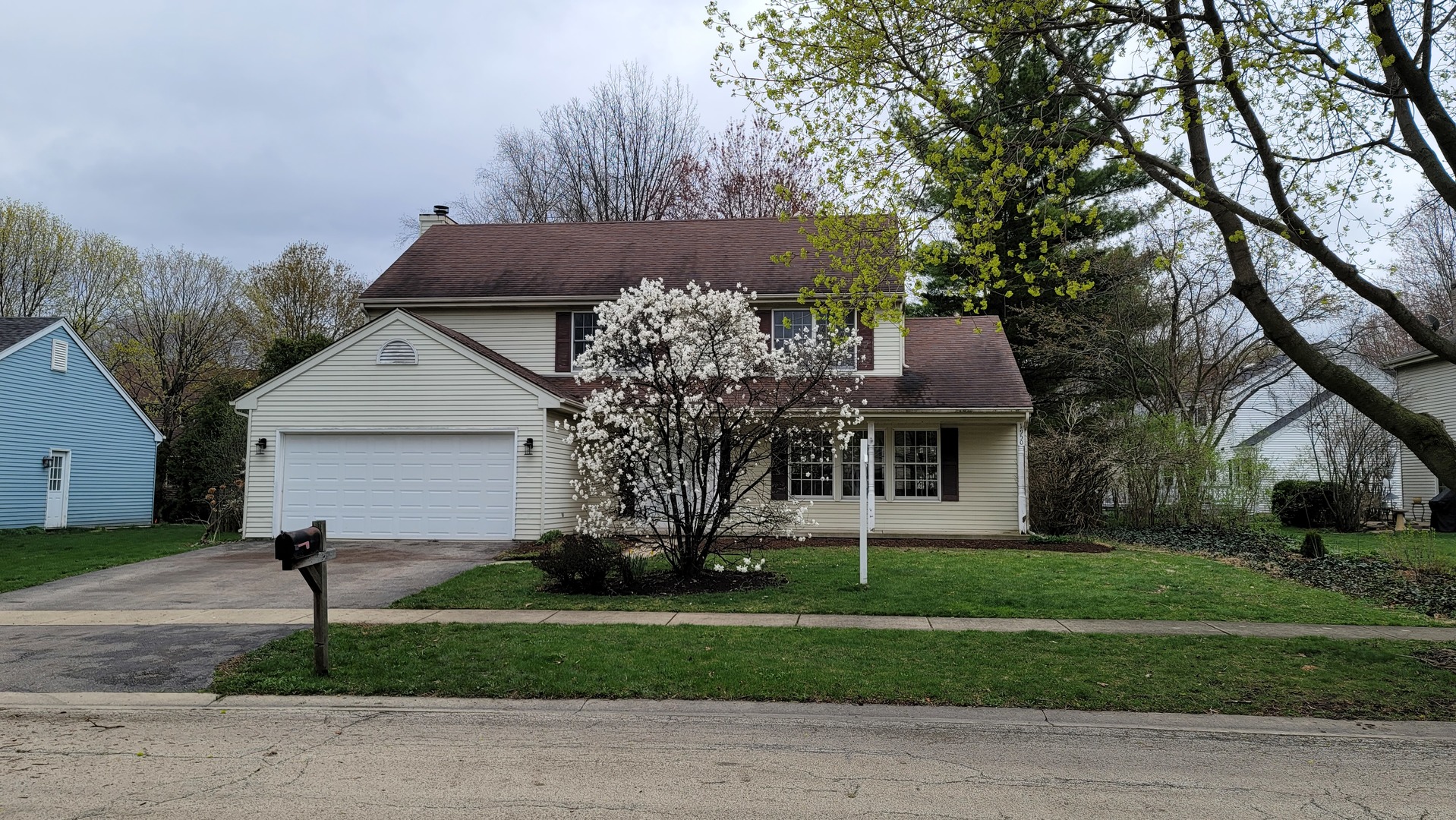 1950 Huntington Road St. Charles, IL 60174 - Photo 1 of 26 front view of house with a yard