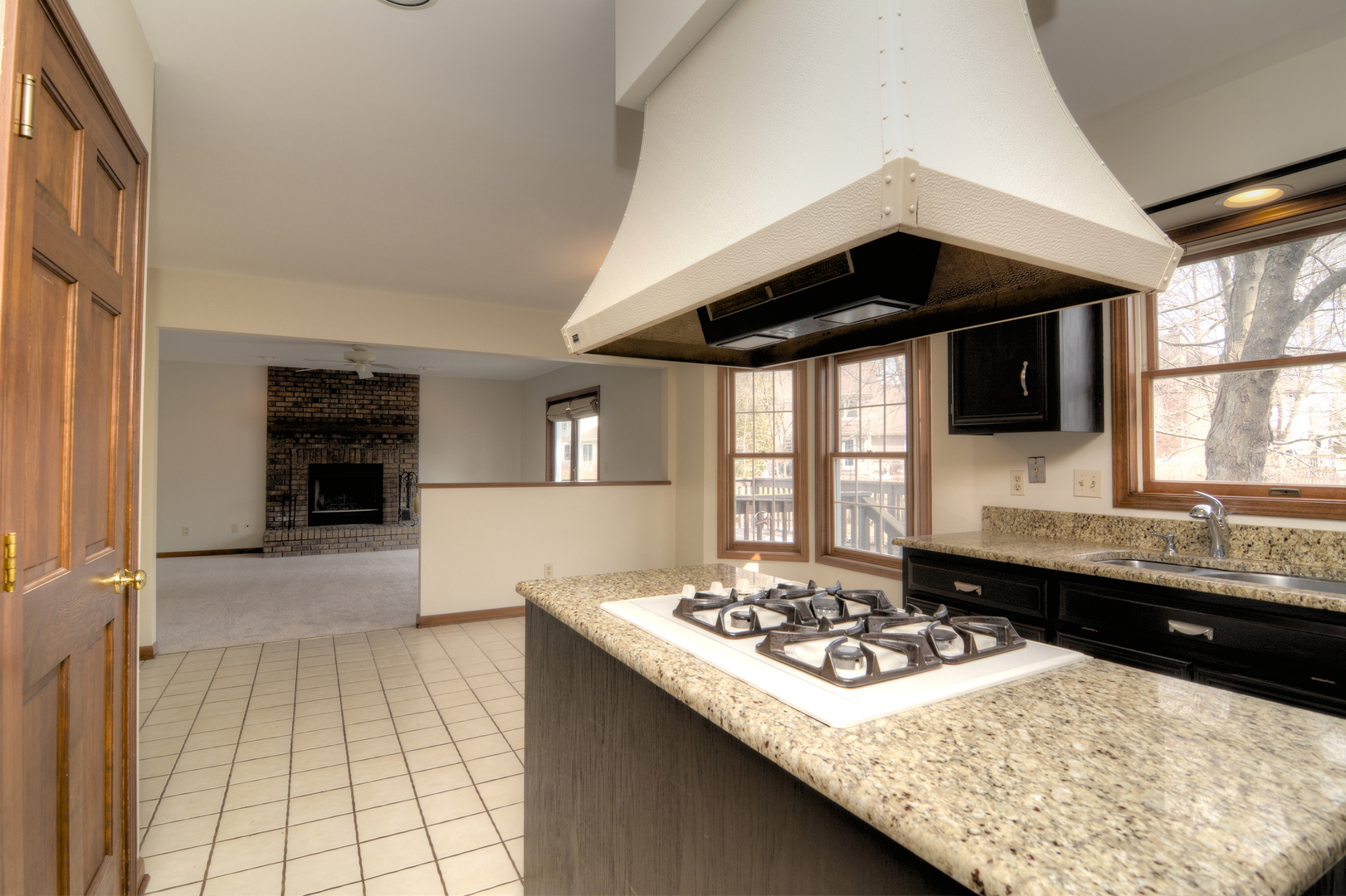 1950 Huntington Road St. Charles, IL 60174 - Photo 12 of 26 a kitchen with a sink stove and cabinets