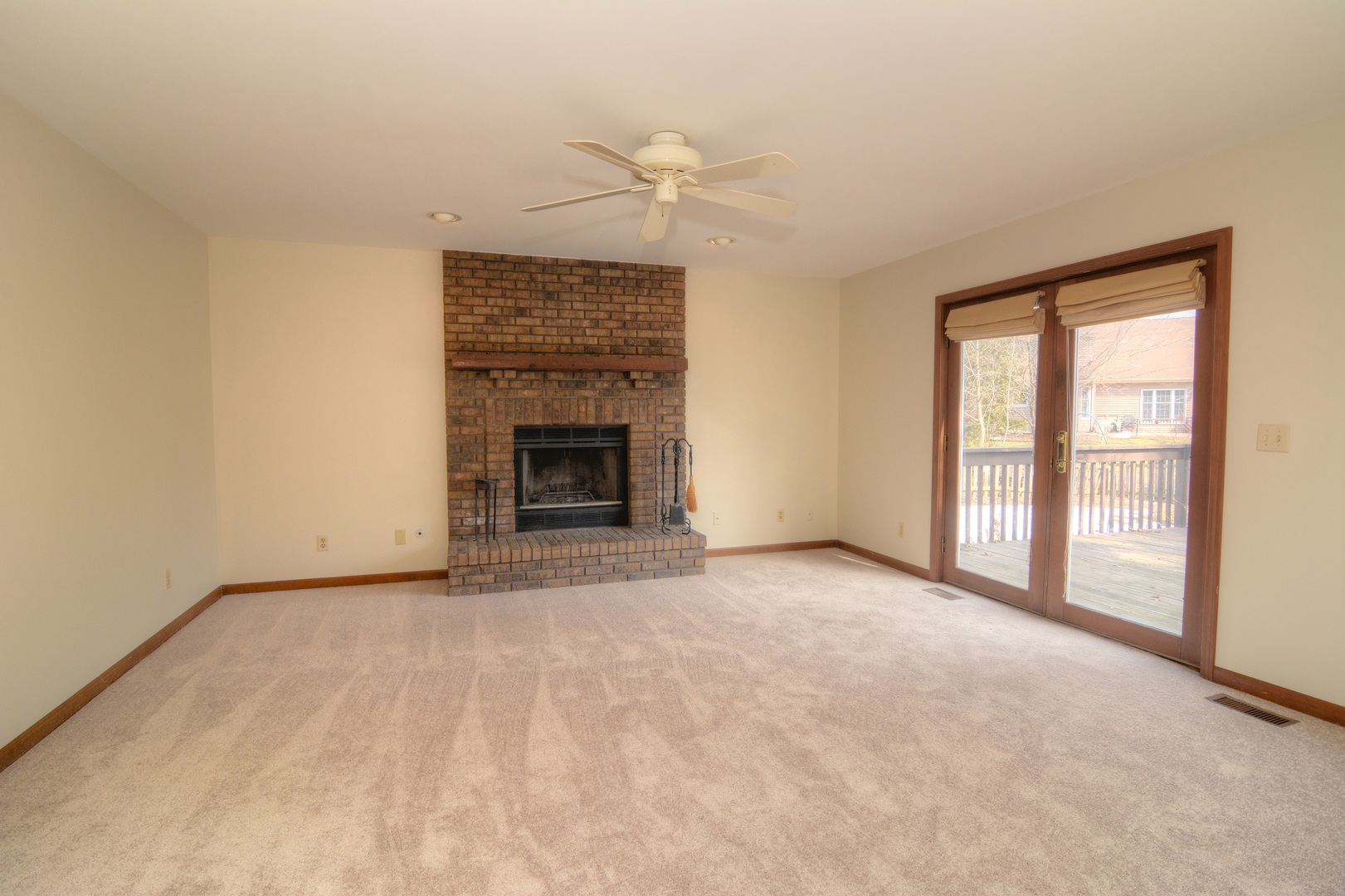 1950 Huntington Road St. Charles, IL 60174 - Photo 16 of 26 a view of an empty room with a fireplace