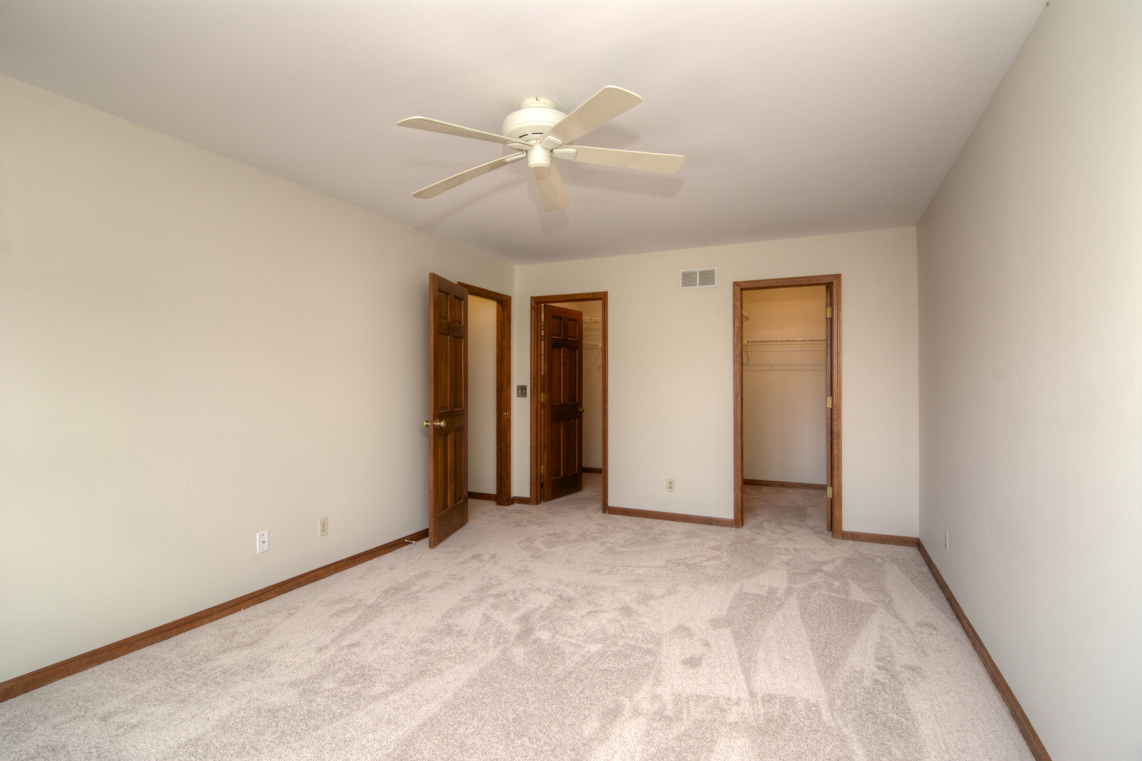 1950 Huntington Road St. Charles, IL 60174 - Photo 19 of 26 a view of an empty room with chandelier fan and fire place