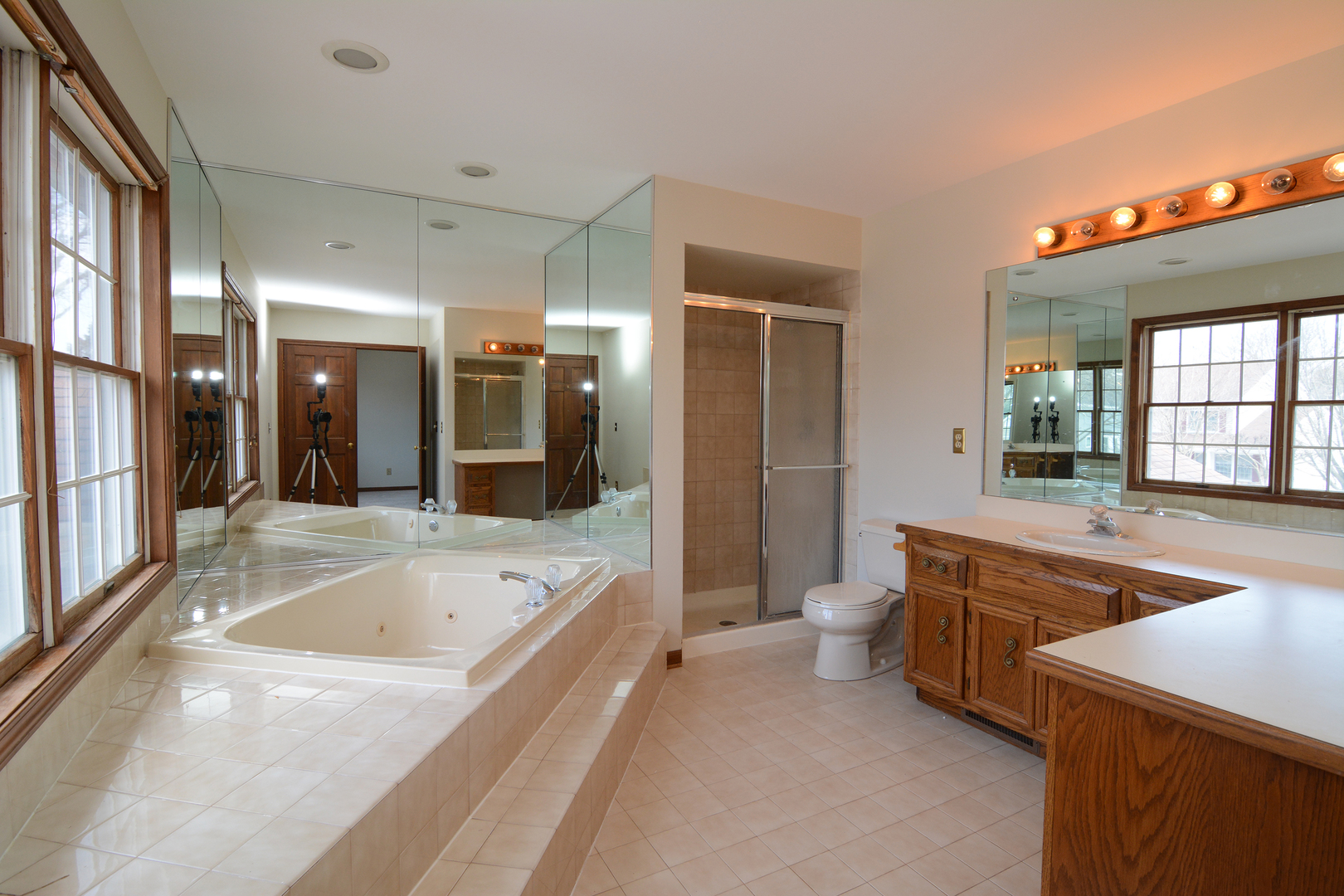1950 Huntington Road St. Charles, IL 60174 - Photo 20 of 26 a spacious bathroom with a granite countertop tub mirror and shower