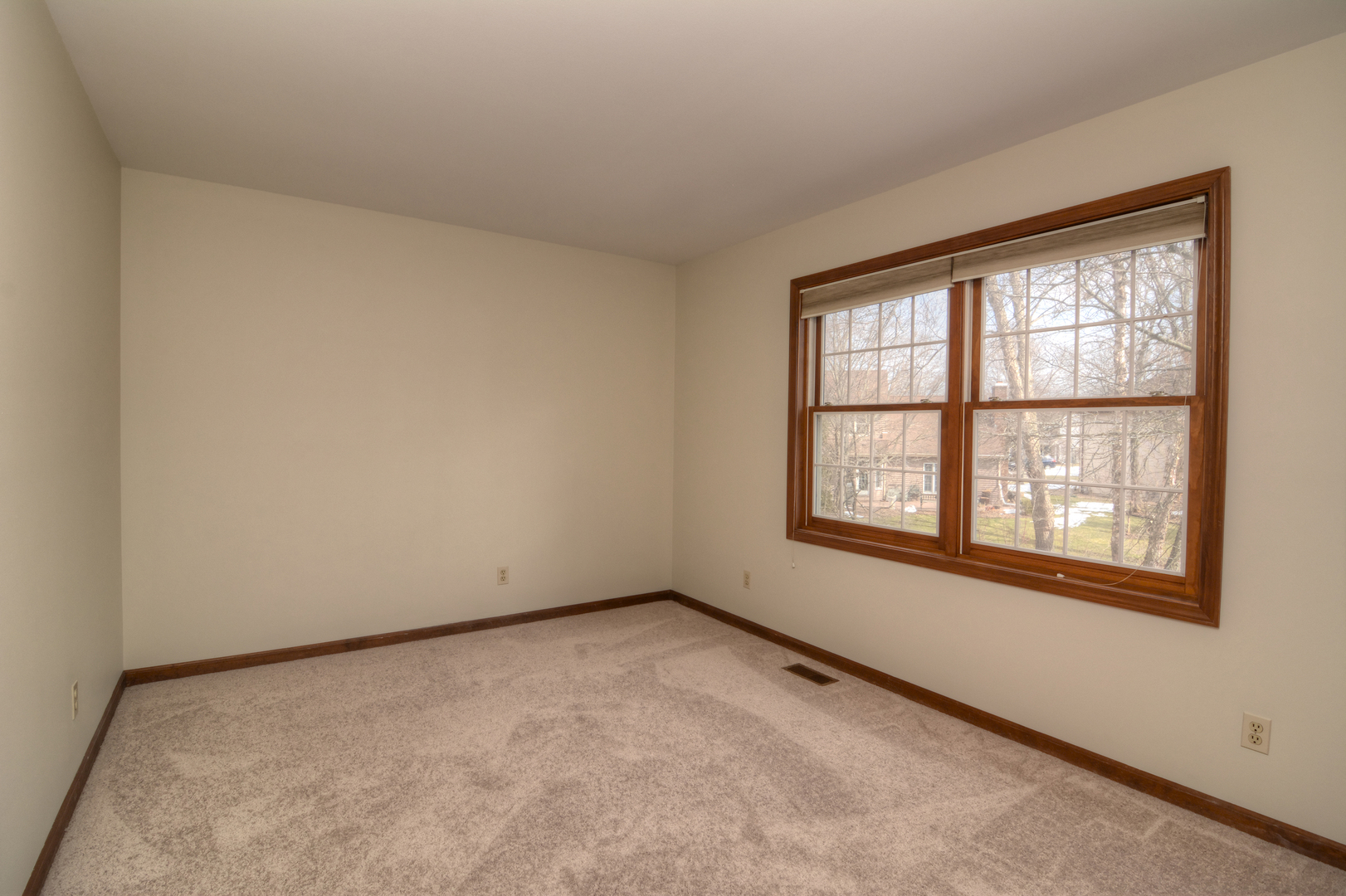 1950 Huntington Road St. Charles, IL 60174 - Photo 21 of 26 an empty room with a window