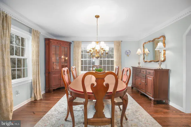 a kitchen with stainless steel appliances granite countertop a stove and a microwave