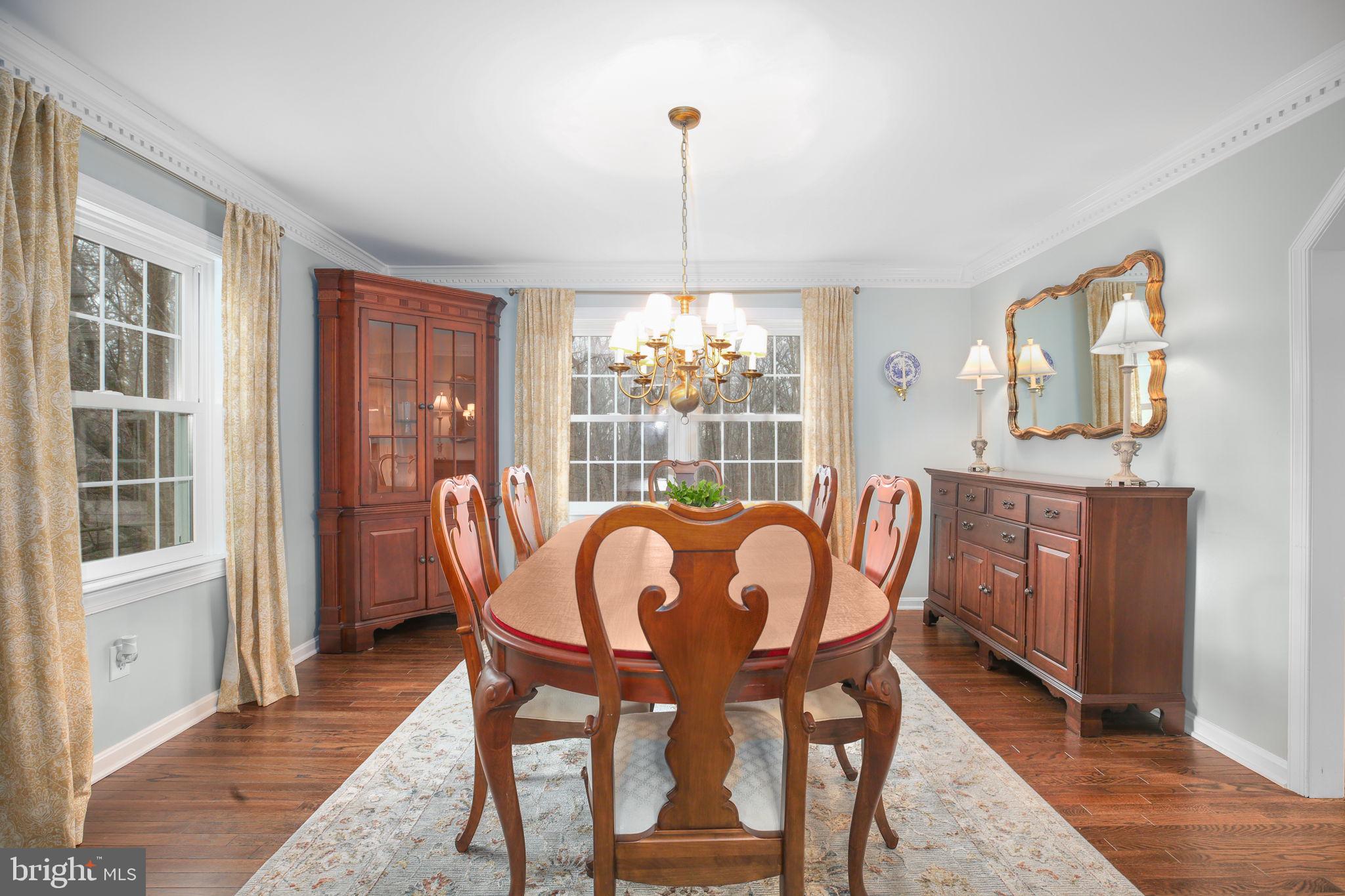 9 Old Ridge Road Fredericksburg, VA 22407 - Photo 11 of 110 a dining room with furniture a chandelier and wooden floor