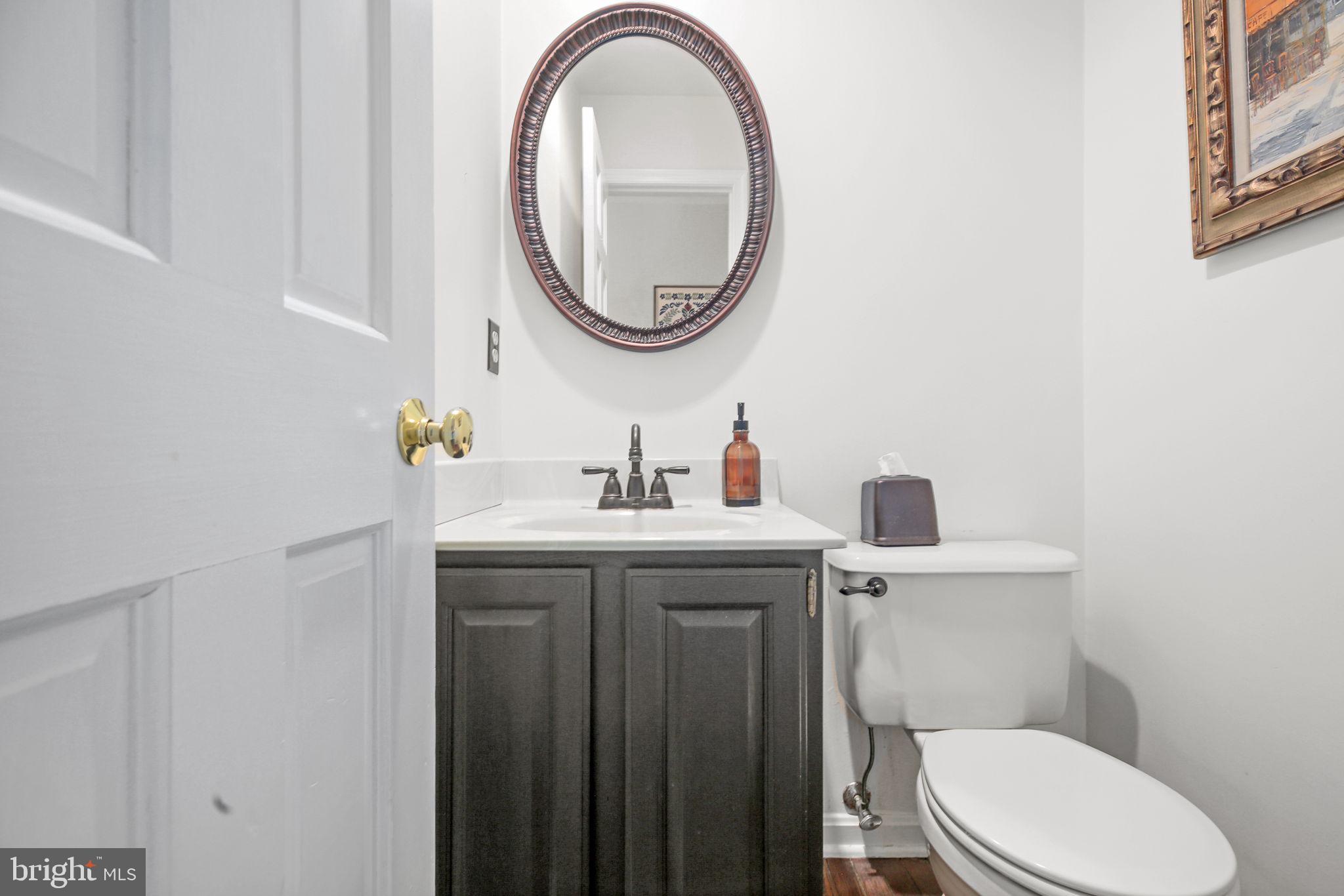 9 Old Ridge Road Fredericksburg, VA 22407 - Photo 23 of 110 a bathroom with a granite countertop toilet sink and mirror
