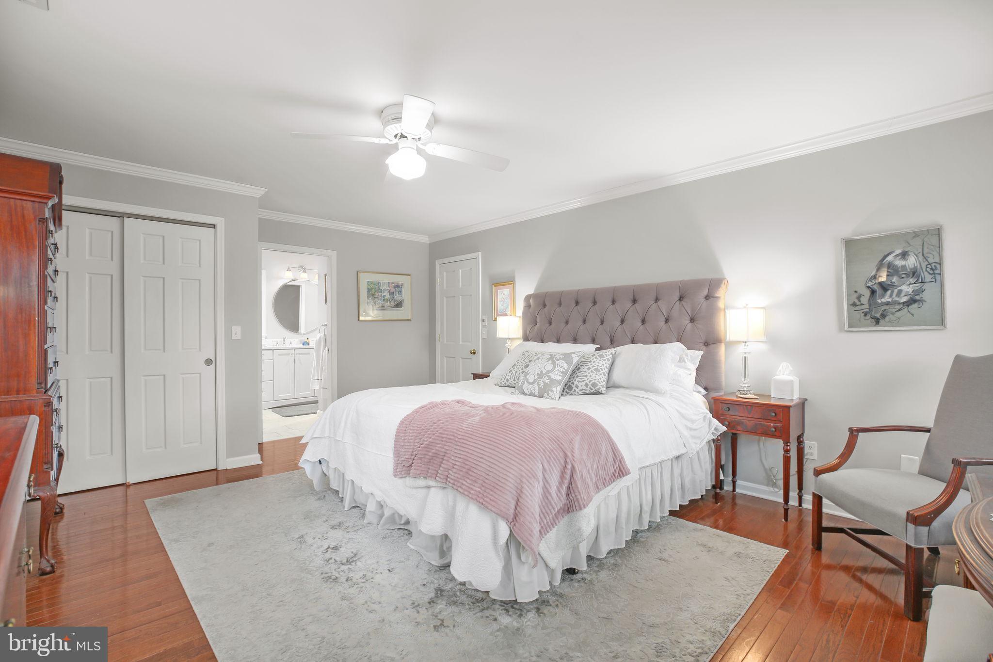 9 Old Ridge Road Fredericksburg, VA 22407 - Photo 28 of 110 a spacious bedroom with a bed and chair