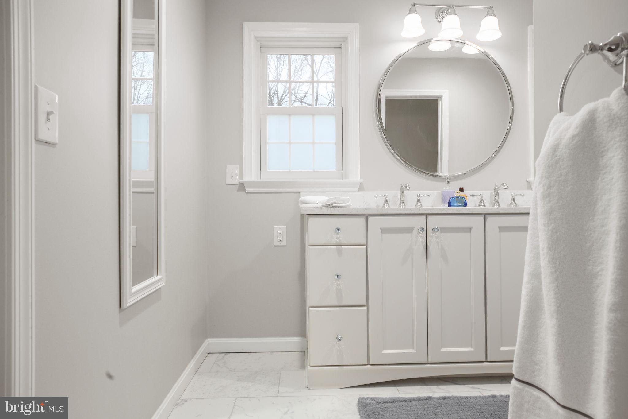 9 Old Ridge Road Fredericksburg, VA 22407 - Photo 33 of 110 a bathroom with a sink and a mirror