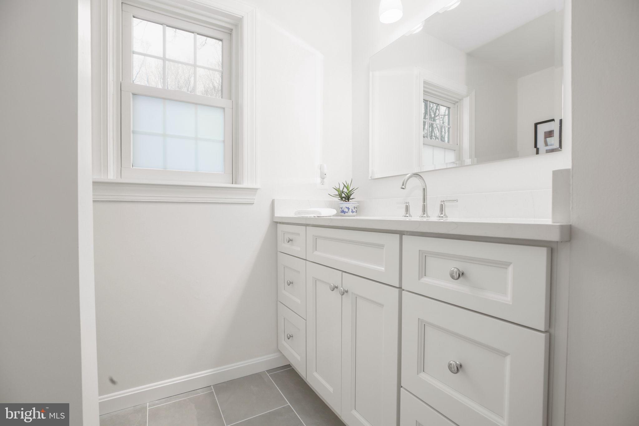 9 Old Ridge Road Fredericksburg, VA 22407 - Photo 35 of 110 a bathroom with a sink and a mirror