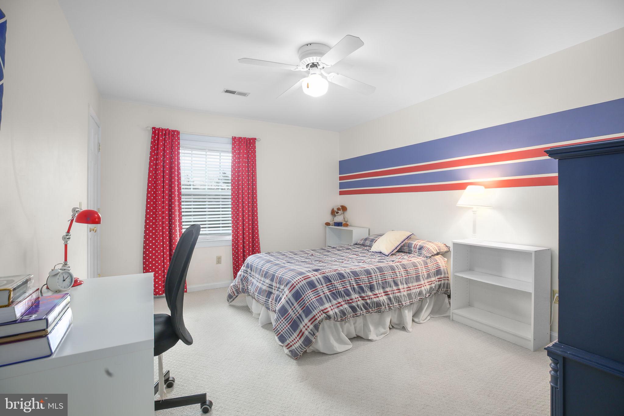 9 Old Ridge Road Fredericksburg, VA 22407 - Photo 36 of 110 a bedroom with a bed and a chandelier