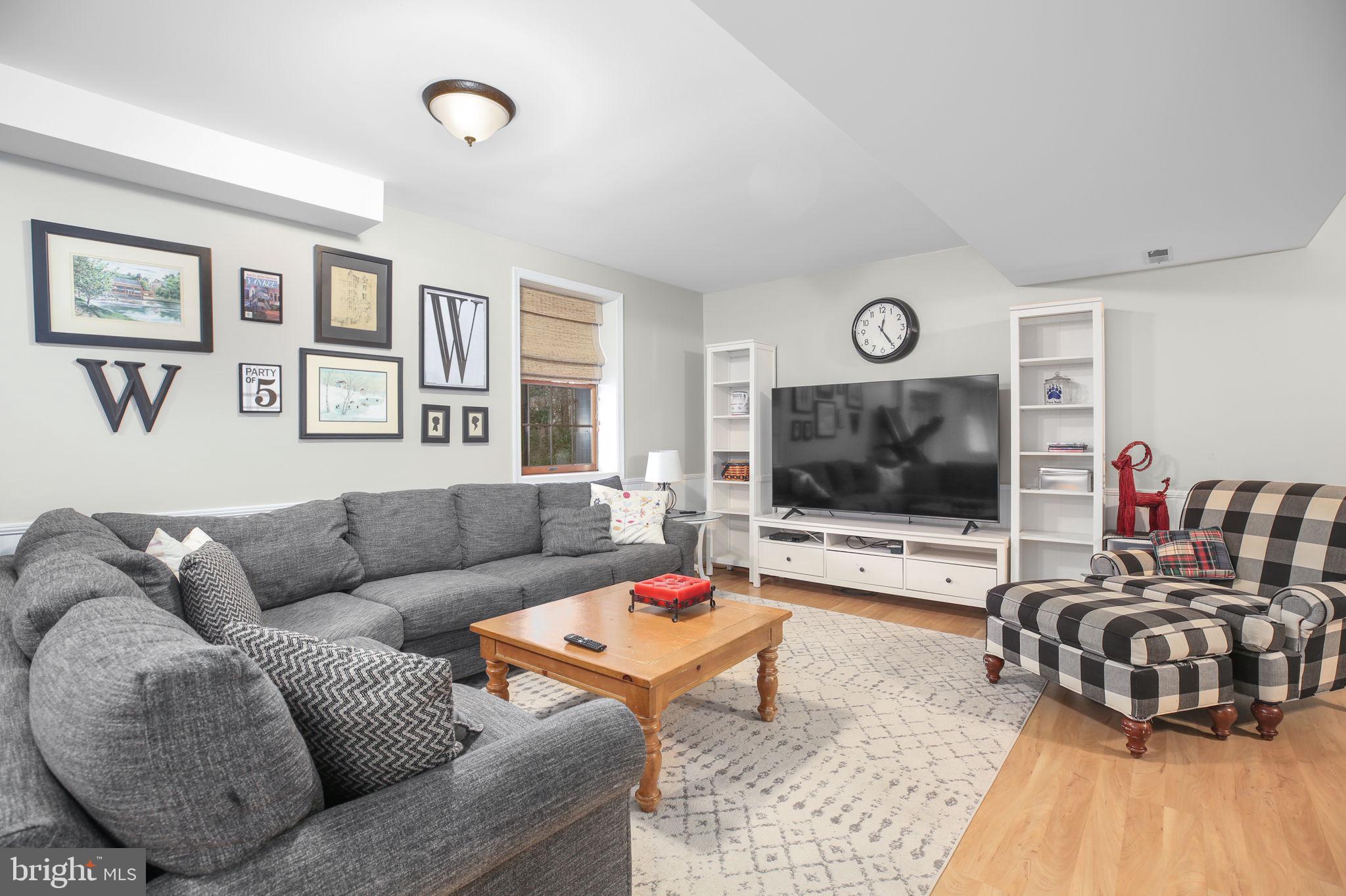 9 Old Ridge Road Fredericksburg, VA 22407 - Photo 48 of 110 a living room with furniture and a flat screen tv