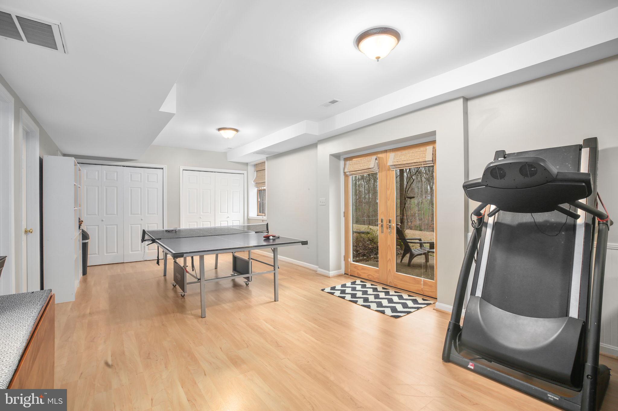 9 Old Ridge Road Fredericksburg, VA 22407 - Photo 50 of 110 a view of a hallway with wooden floor and furniture