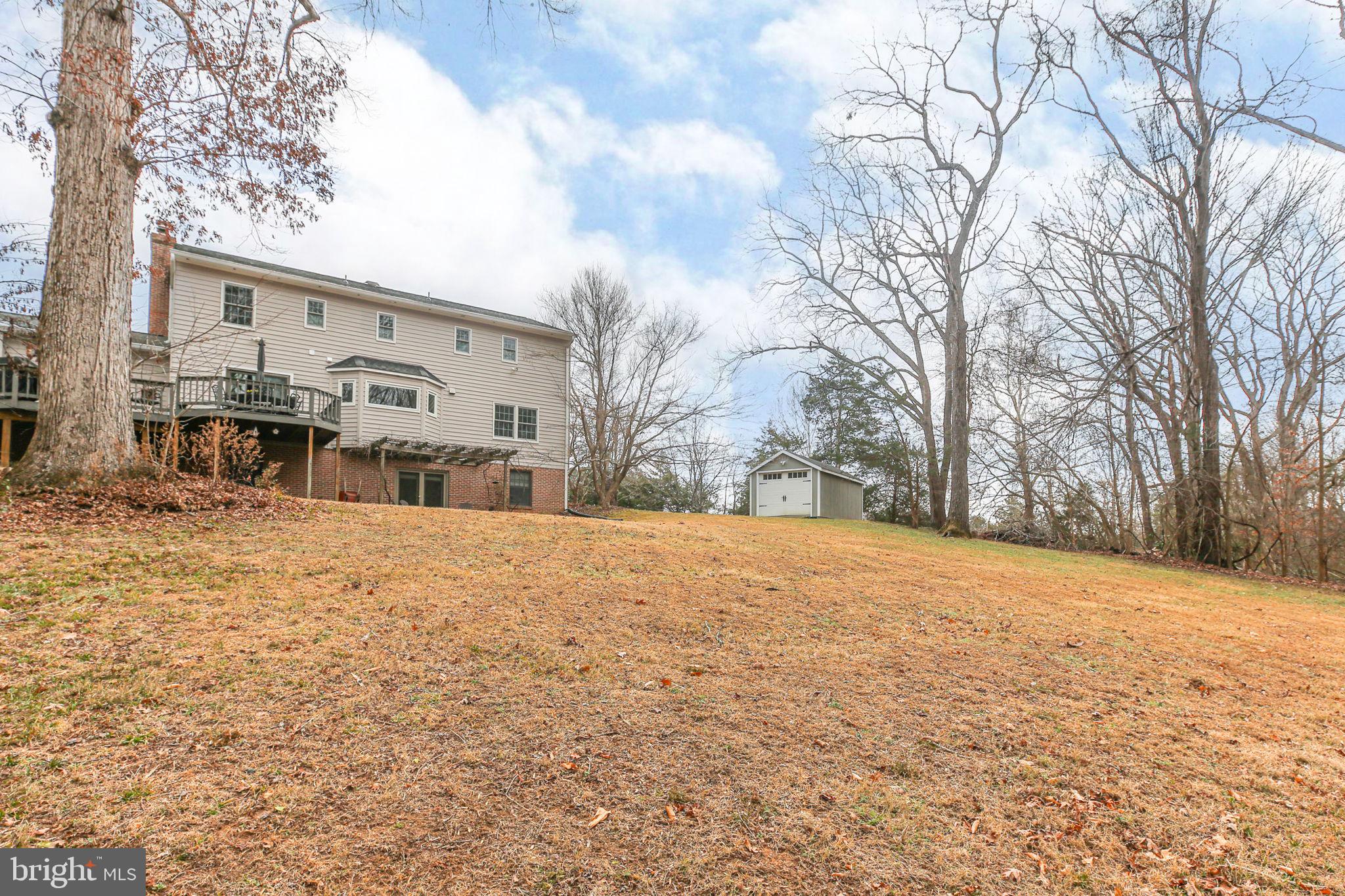 9 Old Ridge Road Fredericksburg, VA 22407 - Photo 73 of 110 a backyard of a house with large trees