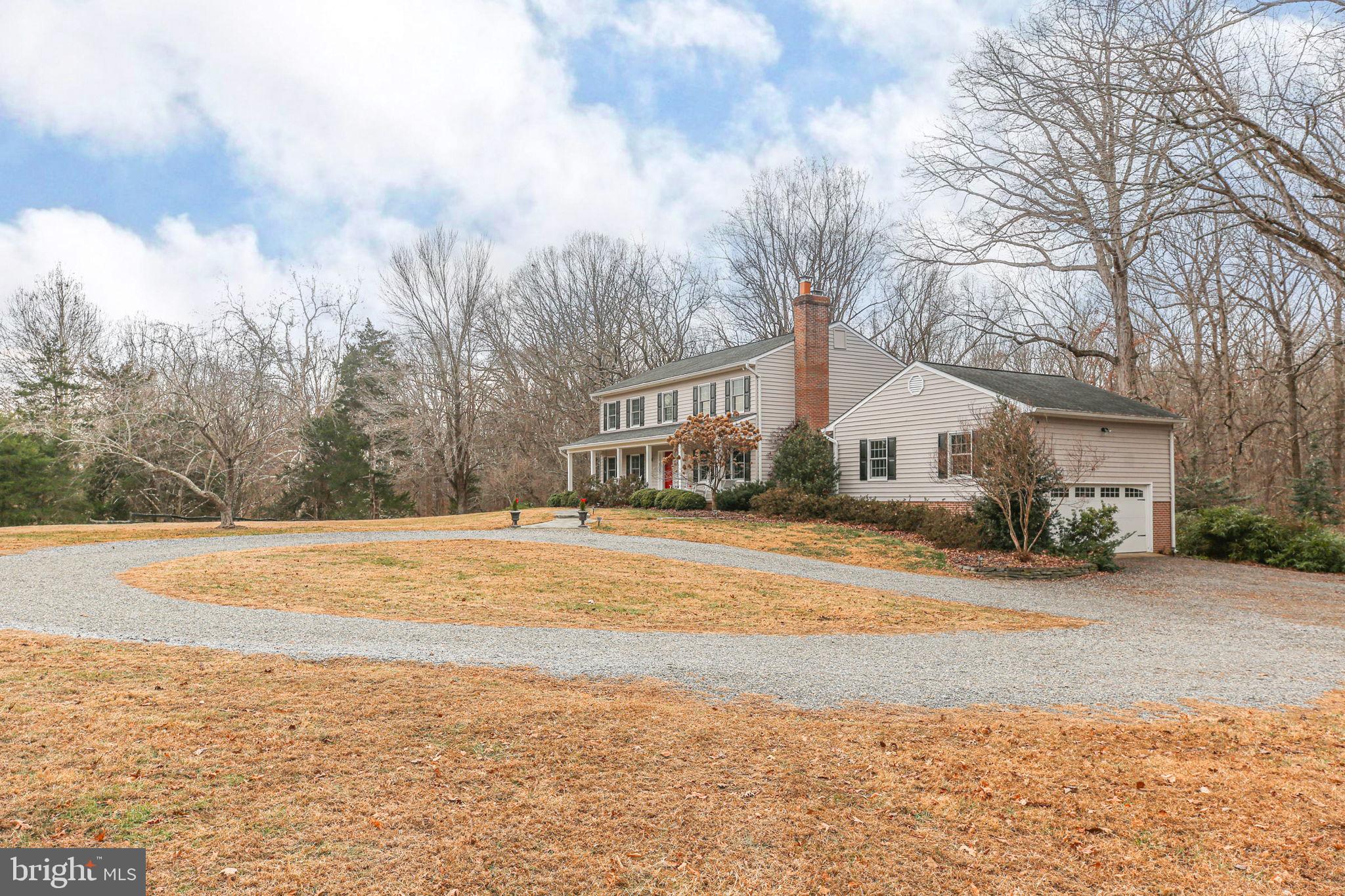 9 Old Ridge Road Fredericksburg, VA 22407 - Photo 77 of 110 a front view of a house with a yard and mountain view in back