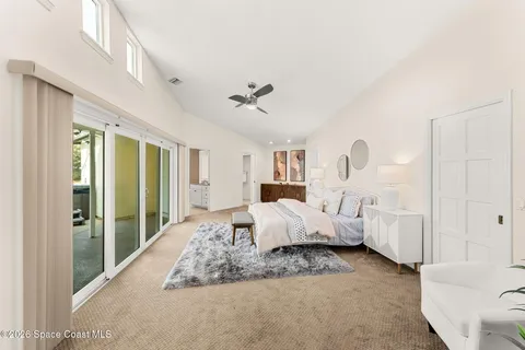 a living room with furniture white walls and white walls