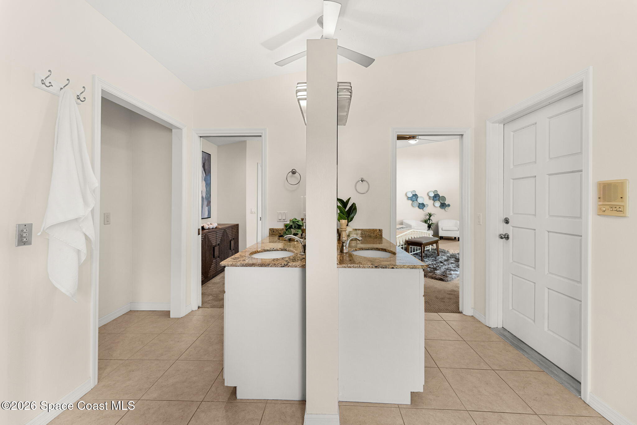 3070 Rio Plumosa North Indialantic, FL 32903 - Photo 15 of 29 a living room with furniture a refrigerator and a table