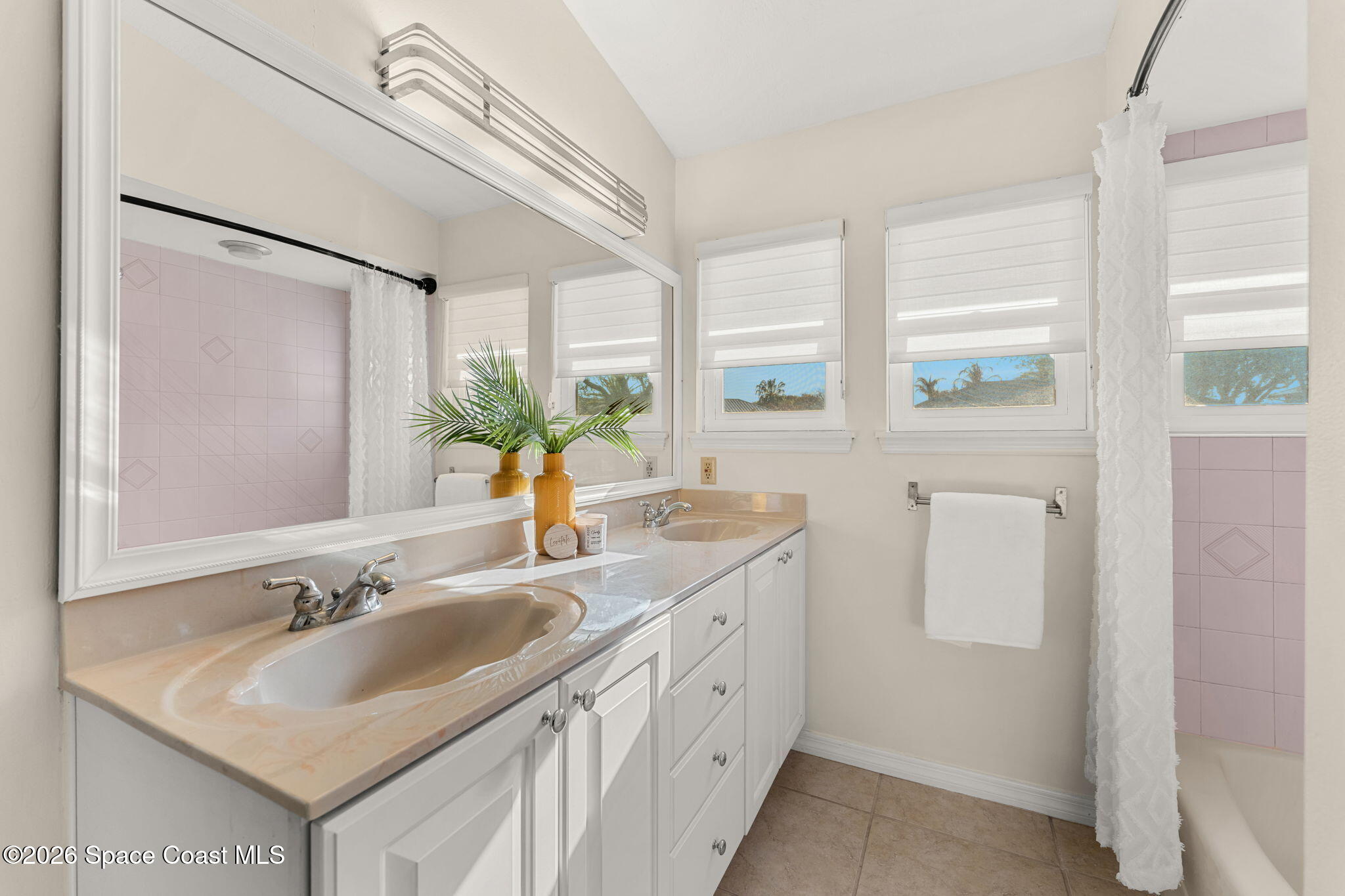 3070 Rio Plumosa North Indialantic, FL 32903 - Photo 19 of 29 a bathroom with a sink and a mirror