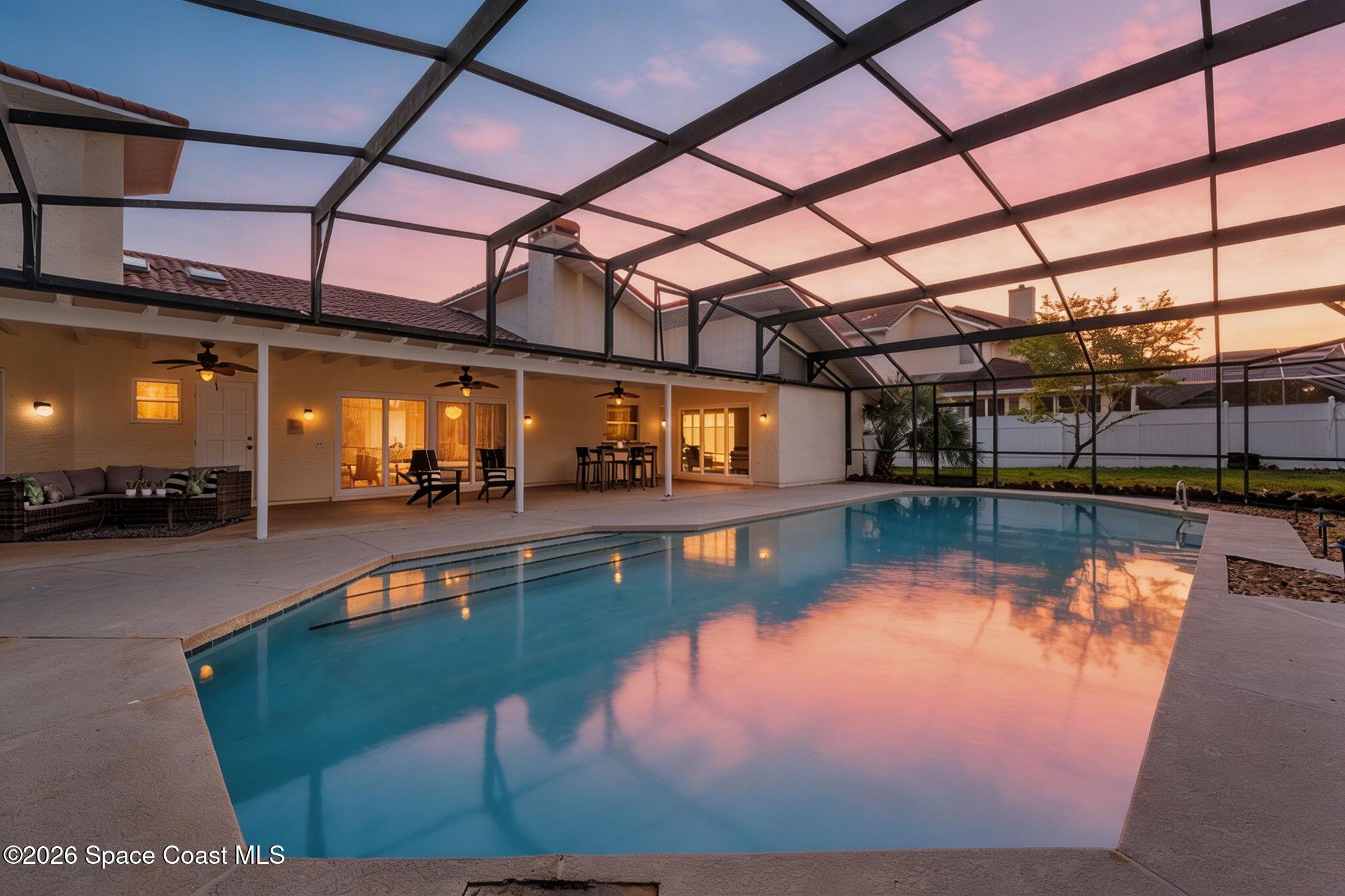3070 Rio Plumosa North Indialantic, FL 32903 - Photo 2 of 29 a view of a swimming pool with a patio