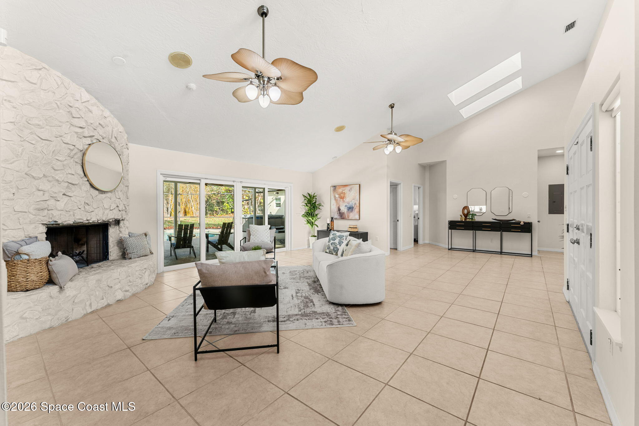 3070 Rio Plumosa North Indialantic, FL 32903 - Photo 3 of 29 a living room with furniture and a fireplace