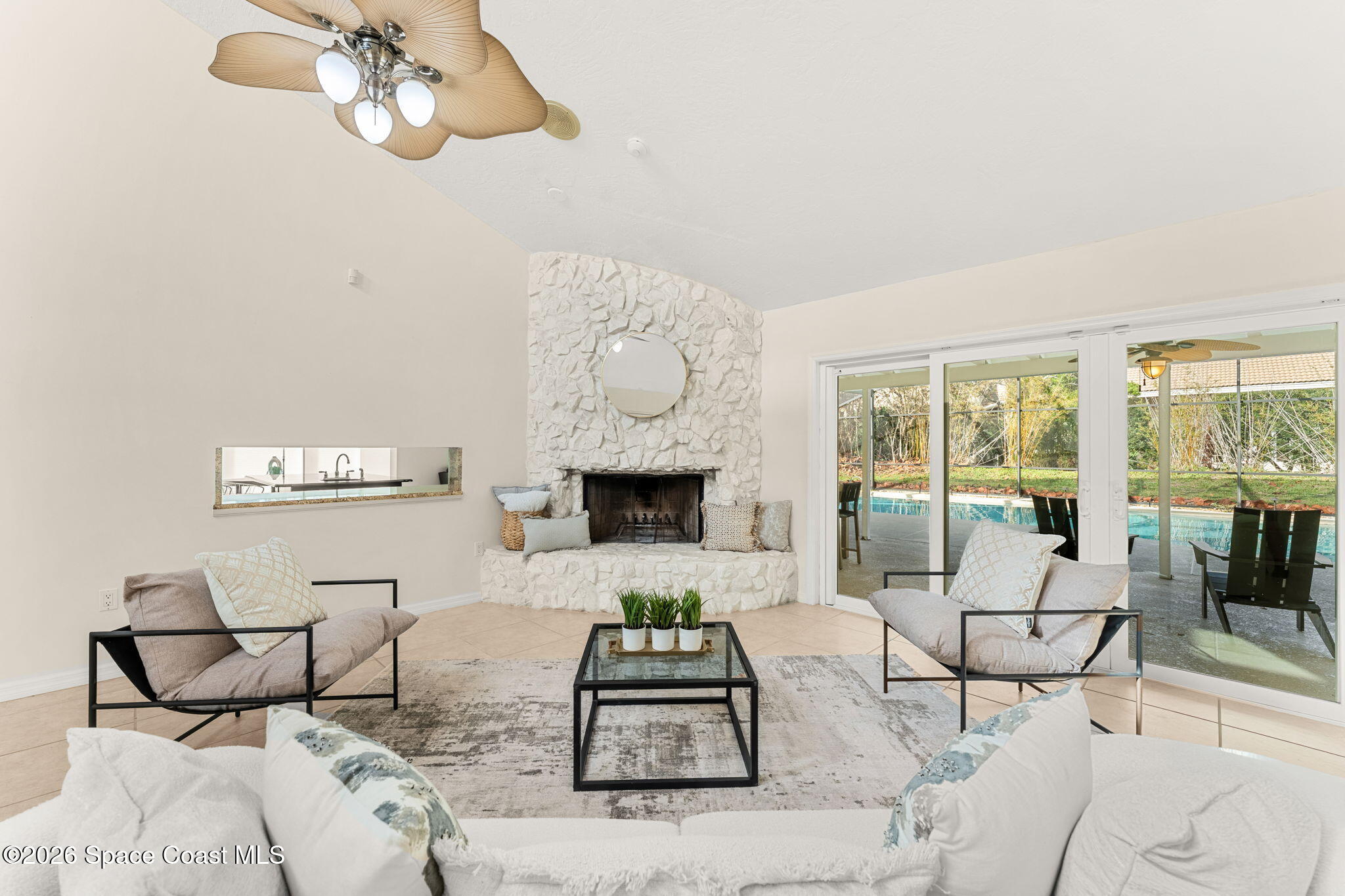 3070 Rio Plumosa North Indialantic, FL 32903 - Photo 4 of 29 a living room with furniture and a fireplace