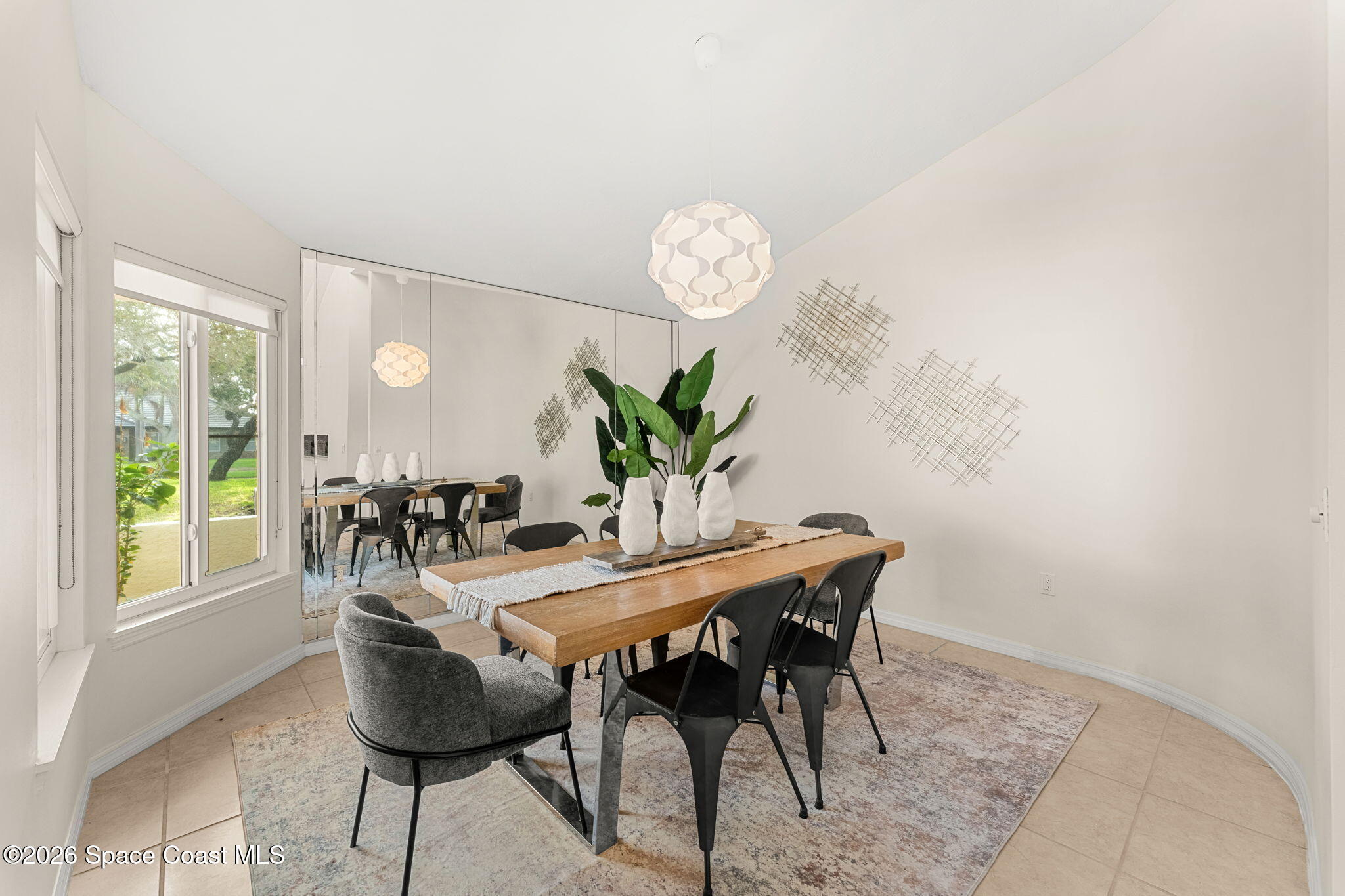 3070 Rio Plumosa North Indialantic, FL 32903 - Photo 5 of 29 a dining room with furniture and window