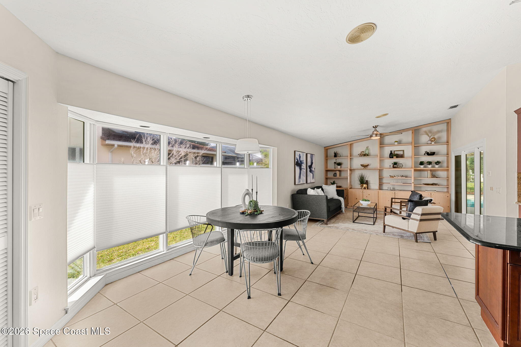 3070 Rio Plumosa North Indialantic, FL 32903 - Photo 6 of 29 a living room with furniture and a table