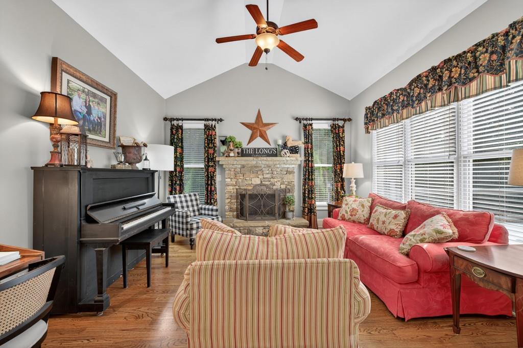3315 Kylee Dawn Circle Lawrenceville, GA 30045 - Photo 27 of 97 a bedroom with furniture and a fireplace