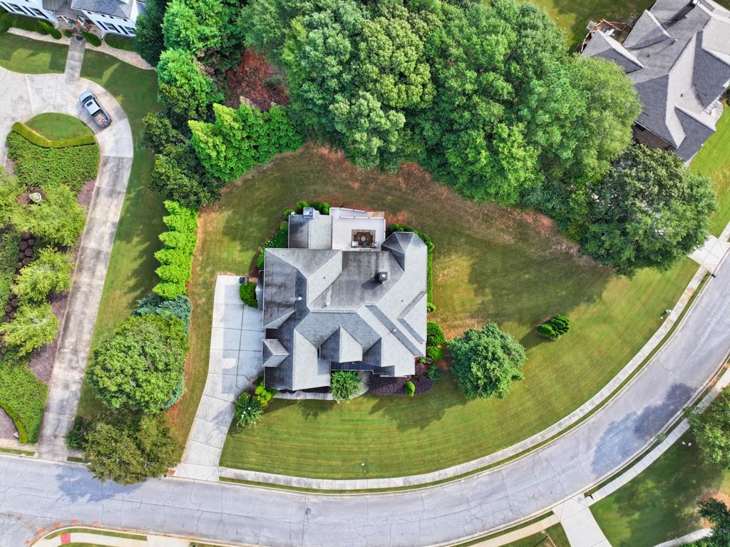 3315 Kylee Dawn Circle Lawrenceville, GA 30045 - Photo 90 of 97 an aerial view of a house with outdoor space swimming pool and lake view